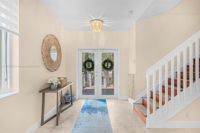 943 Golden Cane Dr, Weston, FL 33327 - entrance foyer with stairway, french doors, and baseboards