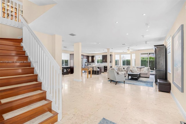 943 Golden Cane Dr, Weston, FL 33327 - living room featuring recessed lighting, stairway, a ceiling fan, baseboards, and ornate columns