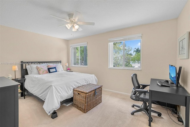 943 Golden Cane Dr, Weston, FL 33327 - bedroom with a ceiling fan, a textured ceiling, light colored carpet, and baseboards