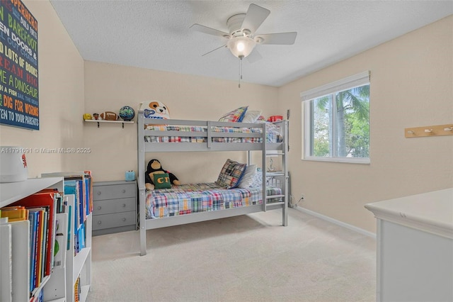 943 Golden Cane Dr, Weston, FL 33327 - carpeted bedroom with baseboards, a ceiling fan, and a textured ceiling