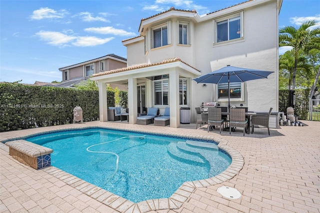 943 Golden Cane Dr, Weston, FL 33327 - view of pool with fence, a patio area, an outdoor living space, and a fenced in pool