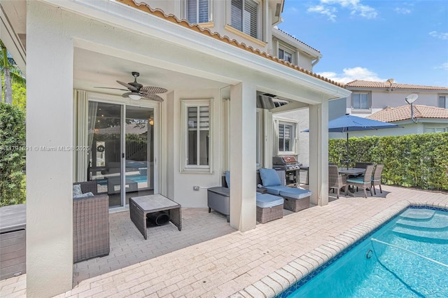 943 Golden Cane Dr, Weston, FL 33327 - exterior space with a patio area, outdoor lounge area, outdoor dining space, grilling area, and a ceiling fan