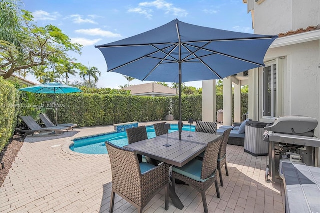 943 Golden Cane Dr, Weston, FL 33327 - view of swimming pool featuring a fenced in pool, area for grilling, a patio area, outdoor dining space, and a fenced backyard