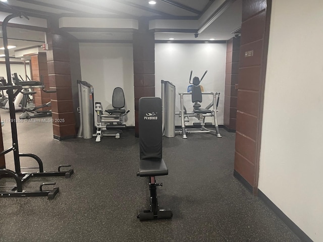 exercise room with recessed lighting