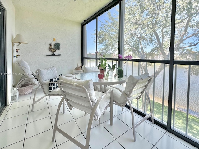 6193 Pointe Regal Cir Unit 304, Delray Beach, FL 33484 - sunroom / solarium featuring a water view