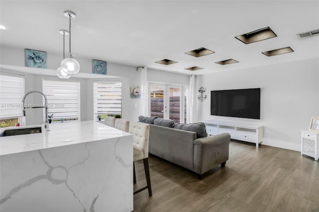 8323 NW 196th Ter, Hialeah, FL 33015 - living room with dark wood-type flooring, visible vents, and baseboards