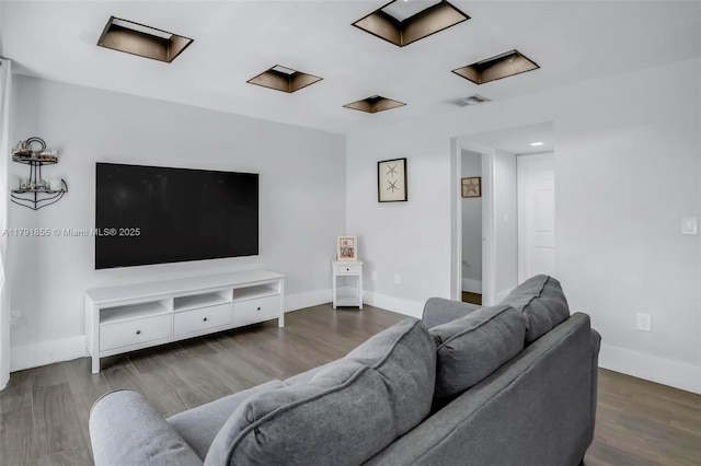 8323 NW 196th Ter, Hialeah, FL 33015 - living room with visible vents, wood finished floors, and baseboards