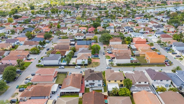 8323 NW 196th Ter, Hialeah, FL 33015 - drone / aerial view featuring a residential view and a water view