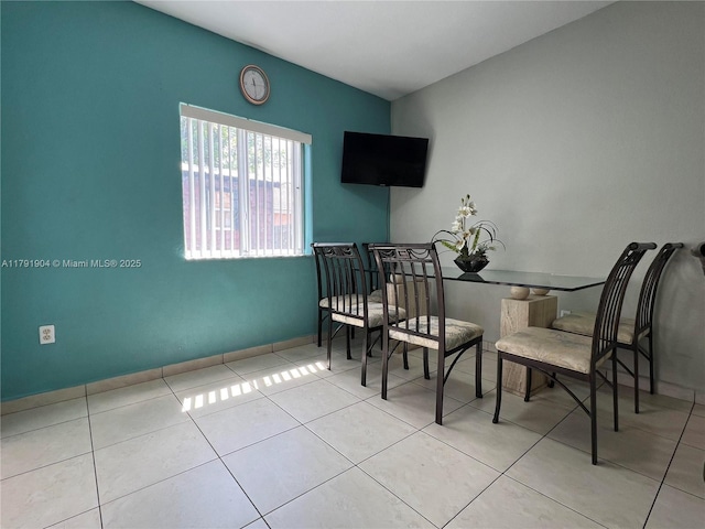 dining area with tile patterned floors