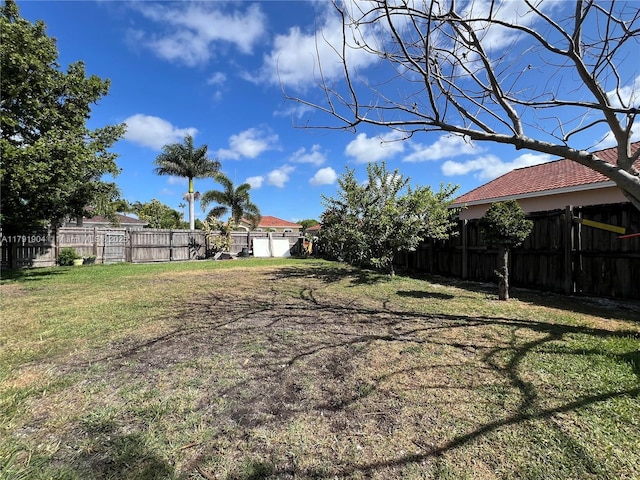 view of yard featuring a fenced backyard