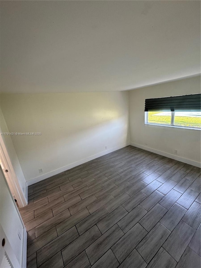 9851 Sandalfoot Blvd Unit 208, Boca Raton, FL 33428 - spare room with wood tiled floors and baseboards