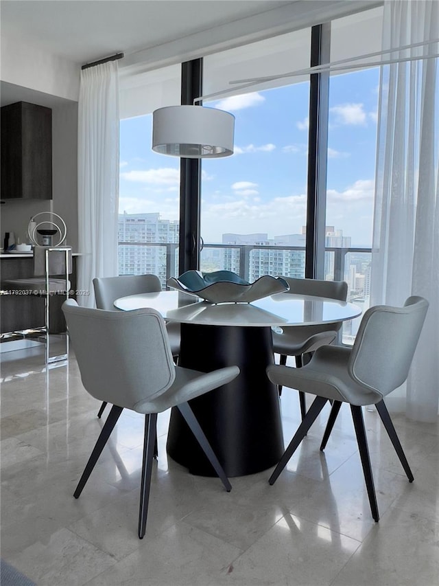 68 SE 6th St Unit 3611, Miami, FL 33131 - dining room with a healthy amount of sunlight, a view of city, and expansive windows