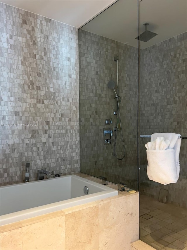 68 SE 6th St Unit 3611, Miami, FL 33131 - bathroom featuring tile walls, walk in shower, and tiled tub
