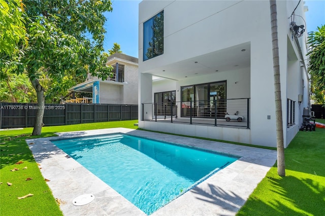1509 SW 15th St, Miami, FL 33145 - view of pool featuring a lawn, a fenced in pool, and fence