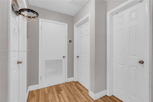 4649 SW 28th Ave, Dania Beach, FL 33312 - dining space featuring baseboards, a barn door, ceiling fan, and light wood-style flooring