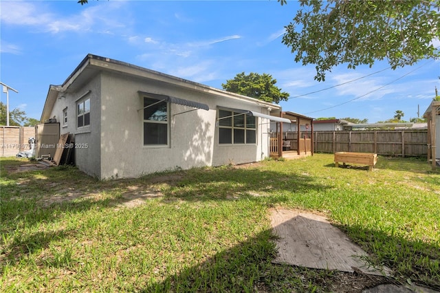 4649 SW 28th Ave, Dania Beach, FL 33312 - rear view of house with a yard, cooling unit, a wooden deck, and a fenced backyard