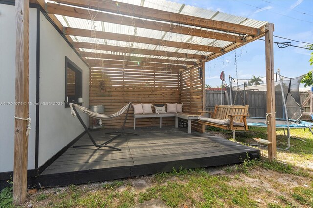 4649 SW 28th Ave, Dania Beach, FL 33312 - wooden deck featuring fence and outdoor lounge area