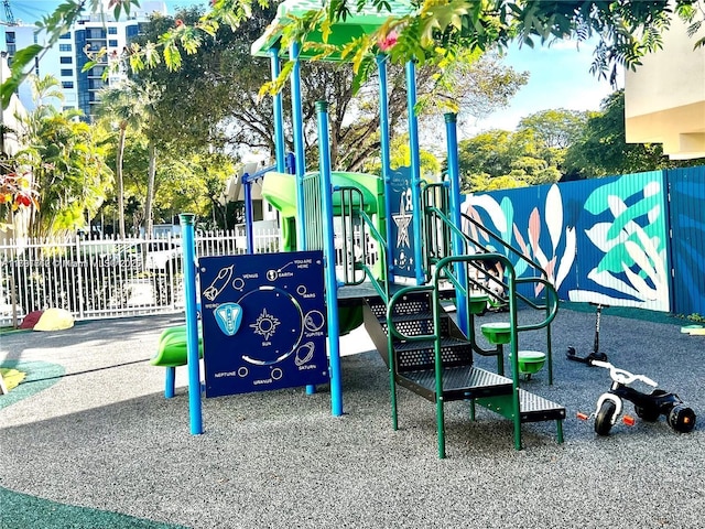 community play area featuring fence