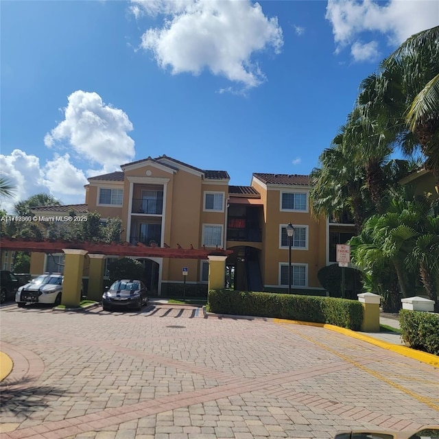 2351 W Preserve Way Unit 205, Miramar, FL 33025 - view of property featuring uncovered parking