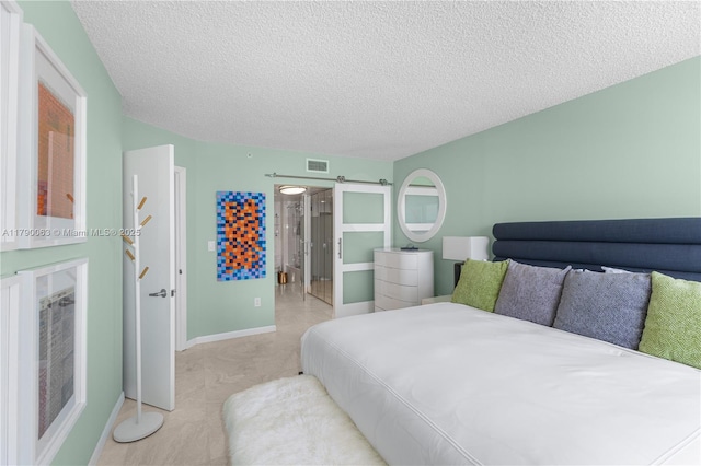 bedroom featuring baseboards, light colored carpet, a textured ceiling, and visible vents