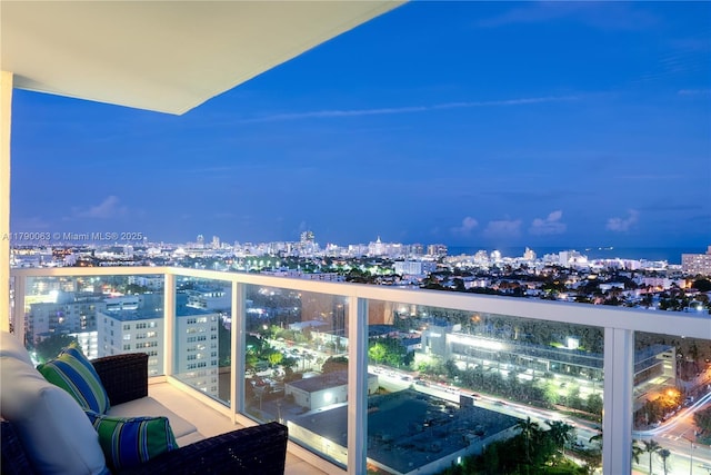 650 W Ave Unit 2102, Miami Beach, FL 33139 - balcony at twilight featuring a view of city lights
