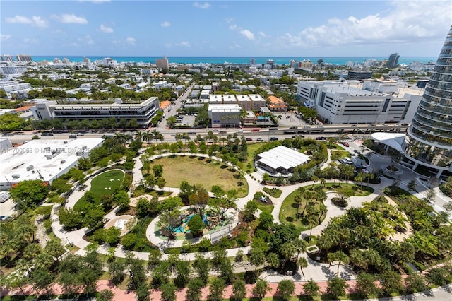 aerial view featuring a water view and a city view