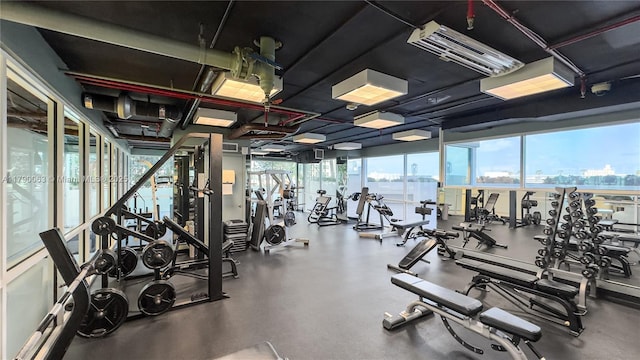 workout area featuring a view of city