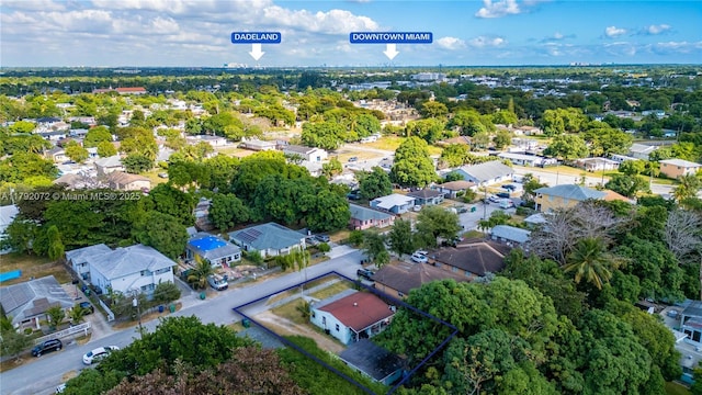 birds eye view of property with a residential view