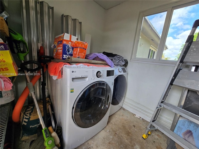 2281 NE 173rd St, North Miami Beach, FL 33160 - washroom featuring plenty of natural light and washer and clothes dryer