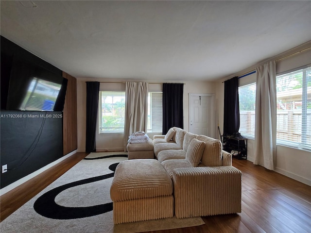 2281 NE 173rd St, North Miami Beach, FL 33160 - living area with wood finished floors and baseboards