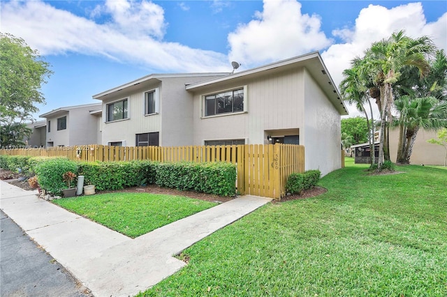 5000 S University Dr, Davie, FL 33328 - exterior space featuring a fenced front yard and a front yard
