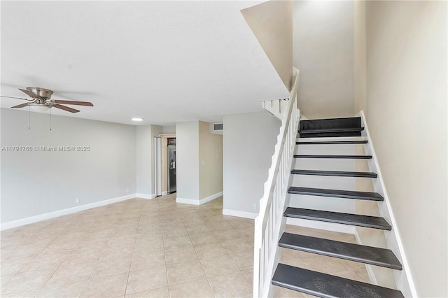 5000 S University Dr, Davie, FL 33328 - staircase with tile patterned flooring, ceiling fan, baseboards, and visible vents