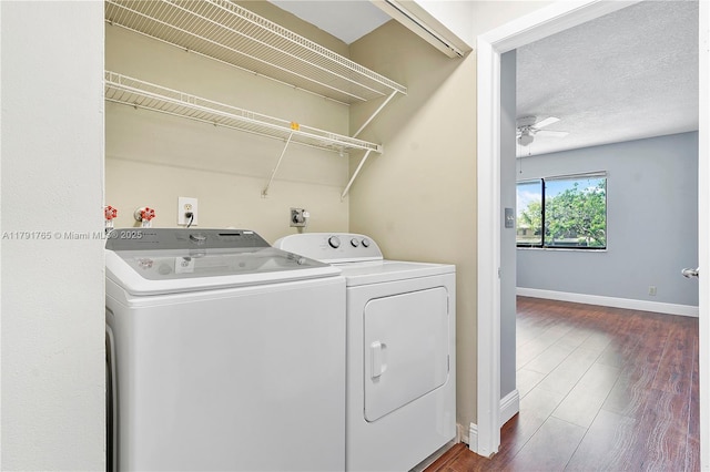 5000 S University Dr, Davie, FL 33328 - clothes washing area with independent washer and dryer, laundry area, dark wood-type flooring, a ceiling fan, and baseboards