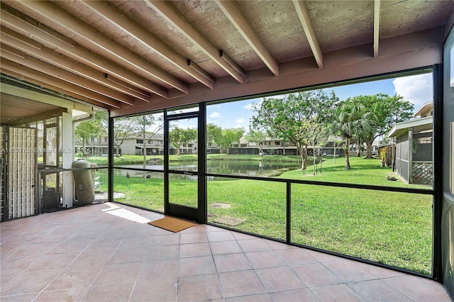 5000 S University Dr, Davie, FL 33328 - unfurnished sunroom featuring a residential view and a water view