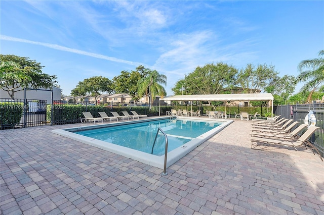 5000 S University Dr, Davie, FL 33328 - community pool featuring a patio area and fence