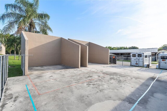 5000 S University Dr, Davie, FL 33328 - view of patio / terrace featuring a gate and fence