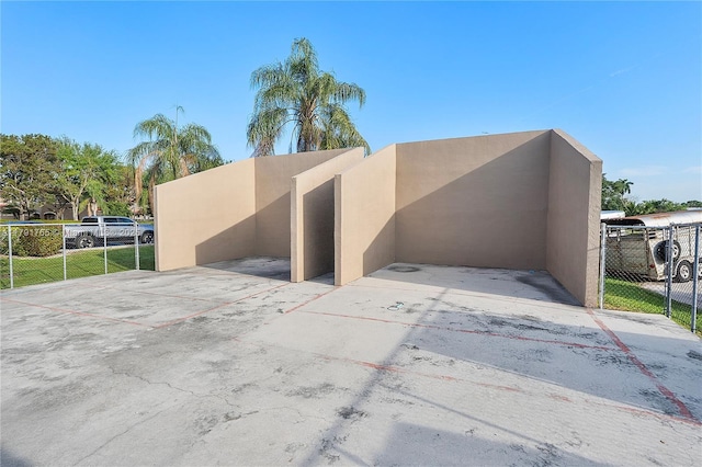 5000 S University Dr, Davie, FL 33328 - exterior space featuring fence, uncovered parking, and stucco siding