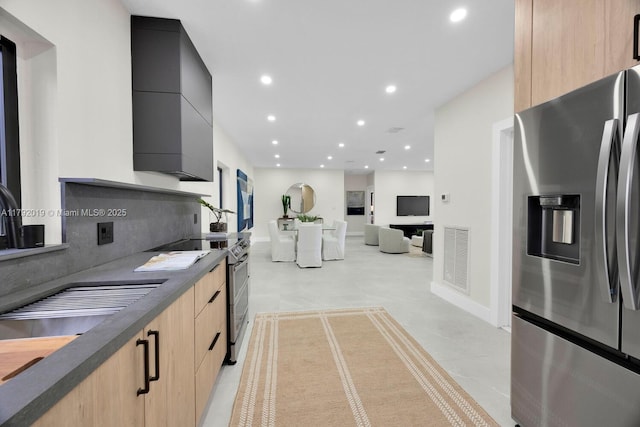305 Fluvia Ave, Coral Gables, FL 33134 - kitchen with modern cabinets, recessed lighting, stainless steel appliances, and light brown cabinets