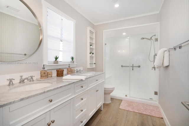 126 Guilford Ct, Tavernier, FL 33070 - bathroom featuring a stall shower, wood finished floors, double vanity, and a sink