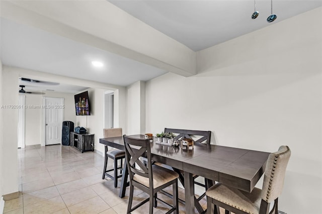 dining space featuring baseboards, recessed lighting, and light tile patterned flooring