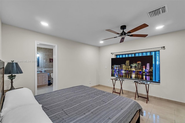 bedroom with baseboards, visible vents, light tile patterned floors, and recessed lighting