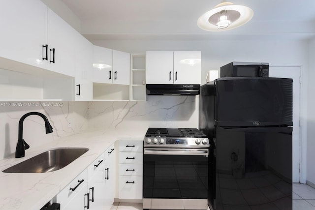 kitchen with open shelves, a sink, under cabinet range hood, black appliances, and light stone countertops