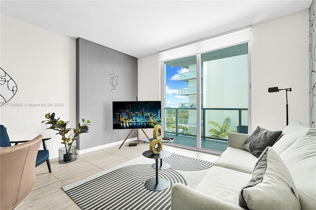 3900 Biscayne Blvd Unit S-920, Miami, FL 33137 - living room featuring floor to ceiling windows and baseboards