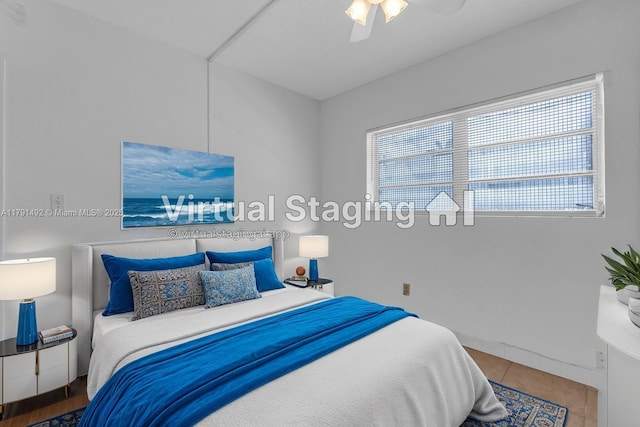 733 NW 30th Ct Unit 1, Wilton Manors, FL 33311 - tiled bedroom featuring ceiling fan