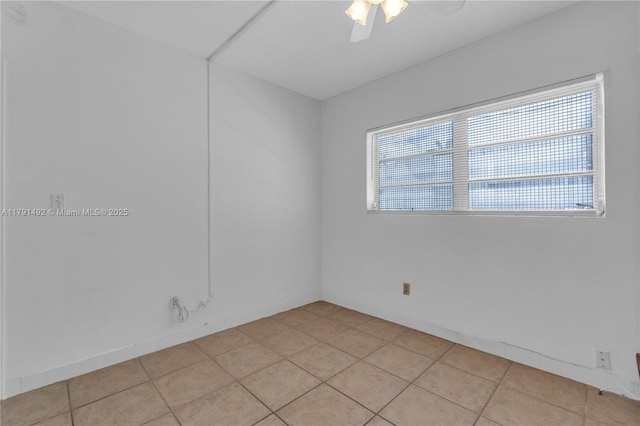 733 NW 30th Ct Unit 1, Wilton Manors, FL 33311 - empty room featuring plenty of natural light, ceiling fan, and light tile patterned floors
