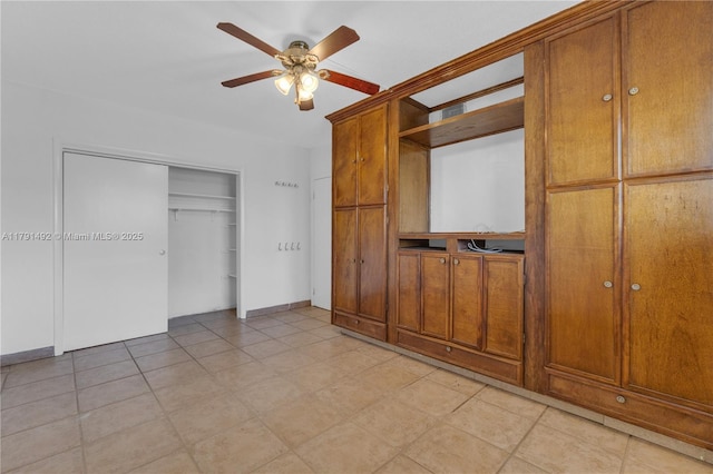 733 NW 30th Ct Unit 1, Wilton Manors, FL 33311 - unfurnished bedroom featuring a closet and a ceiling fan