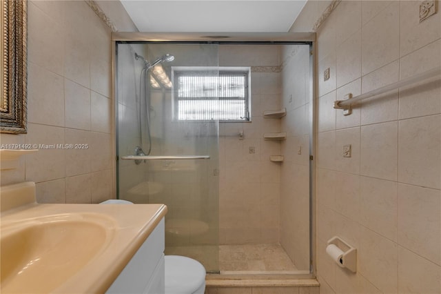 733 NW 30th Ct Unit 1, Wilton Manors, FL 33311 - full bath featuring tile walls, vanity, and a shower stall