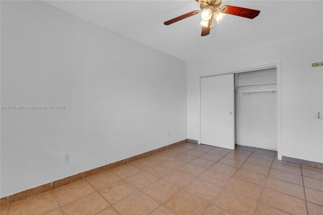 733 NW 30th Ct Unit 1, Wilton Manors, FL 33311 - unfurnished bedroom with a closet and ceiling fan