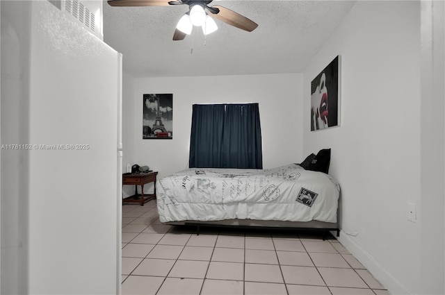 1131 SW 104th Ct, Miami, FL 33174 - bedroom featuring light tile patterned floors, a ceiling fan, visible vents, baseboards, and a textured ceiling