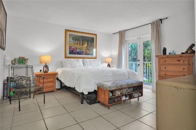 1131 SW 104th Ct, Miami, FL 33174 - bedroom with light tile patterned flooring, a textured ceiling, access to outside, and french doors